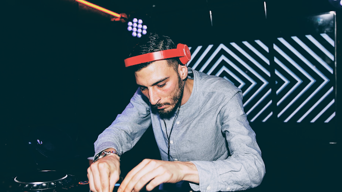 Mixboy Wonder performing behind the decks